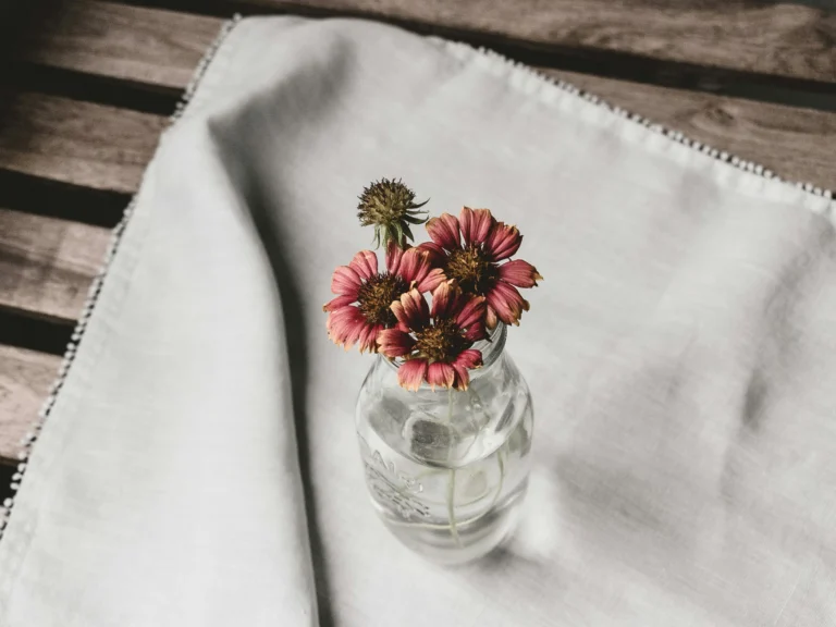 Table cloth with a flower vase